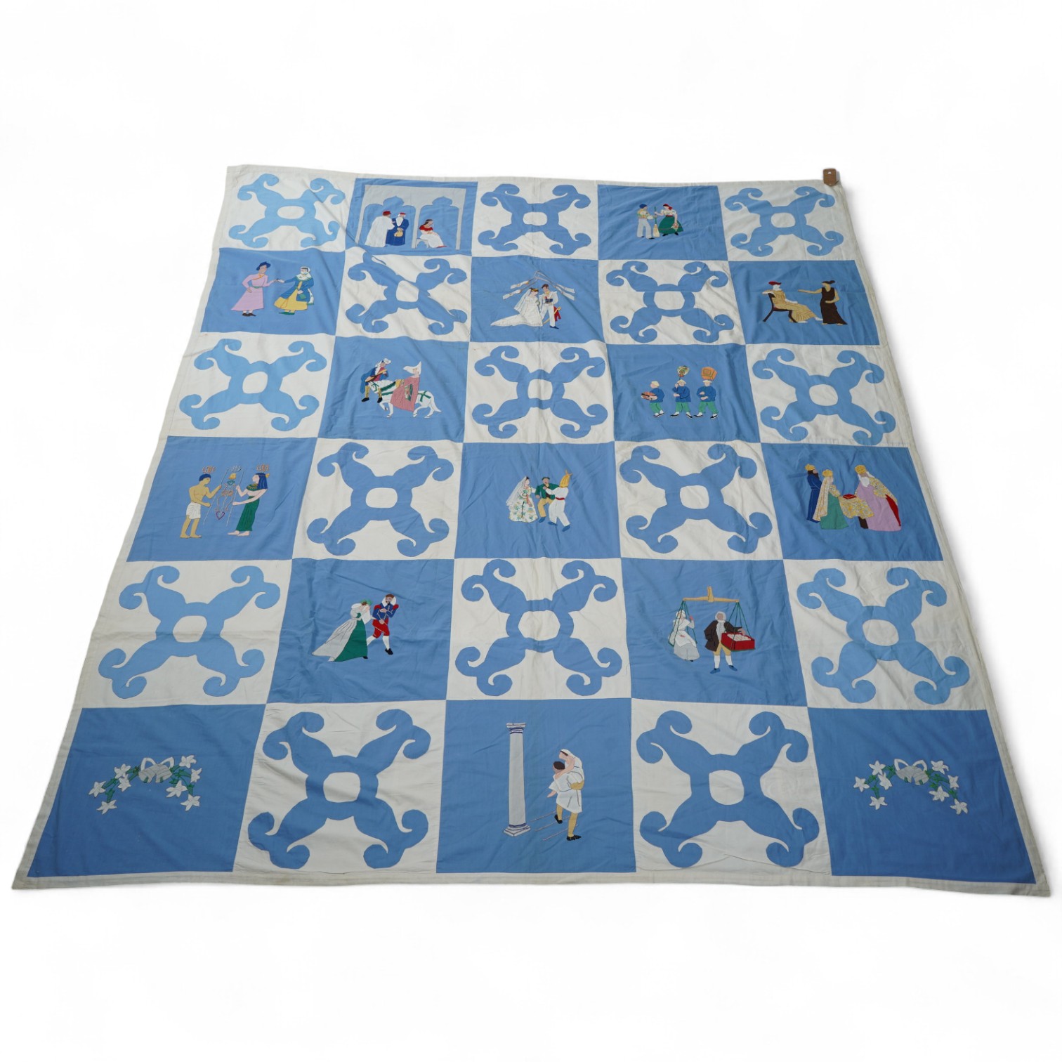 A rare figurative American ‘bridal quilt coverlet’, designed by Marion Cheever Whiteside Newton, whose designs were originally widely published in magazines and sold during the 1940’s-50’s. Her ‘quilting kits’ were also